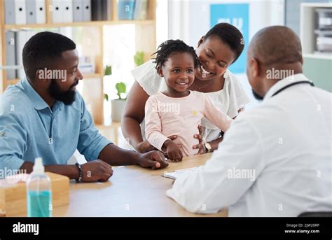 Black Family Girl And Consulting Doctor In Hospital Healthcare And